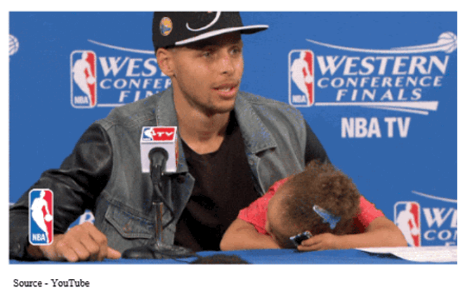Photo of Steph Curry and daughter at a press conference